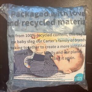 Two of Carter's Blue changing pad covers